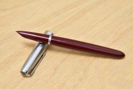 A Parker 51 MKI aerometric fill fountain pen in burgundy with lustraloy cap.