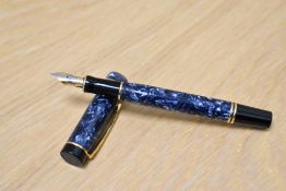 A Parker Duofold International MKI converter fill fountain pen in blue marble with one narrow and