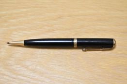 A Parker Duofold propelling pencil in black with decorative broad band to the cap