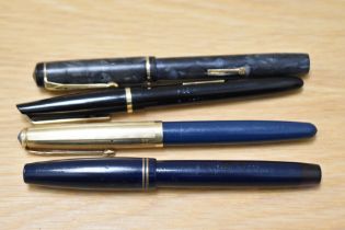 Four fountain pens. A Conway Stewart 476, A Conway Stewart 87 with rolled gold cap (engraved), a