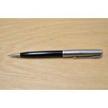 A Parker 51 propelling pencil in black with Lustraloy cap. engraved