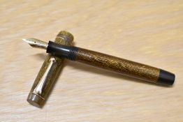 A Parker Duofold Junior Button fill fountain pen in black and brown herringbone with two narrow