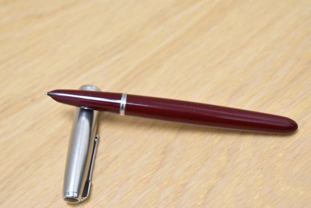 A Parker 51 Aerofill fountain pen in burgundy with Lustraloy cap