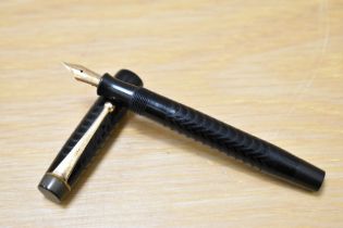 A Parker Ladies button fill fountain pen in chaised BHR having Parker 3 nib made in Canada