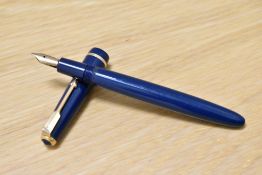 A Parker Duofold Junior aero fill fountain pen in blue with narrow decorative band to the cap having