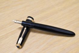 A Parker Duofold Standard aerometric fill fountain pen in black with decorative band to the cap