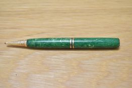 A Parker Duofold prolelling pencil in green with two bands. No top