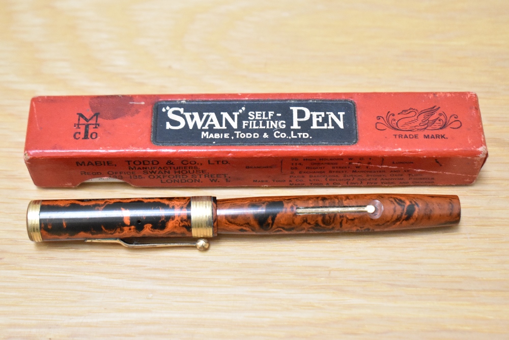 A Mabie Todd Swan Eternal lever fill fountain pen in red black HR with broad band to base of the cap - Image 3 of 3