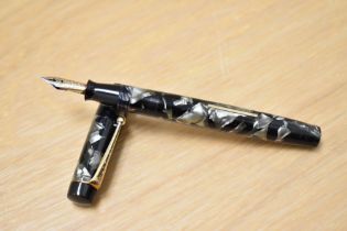 A Stephens 270 lever fill fountain pen in black pearl marble with two narrow bands to the cap having