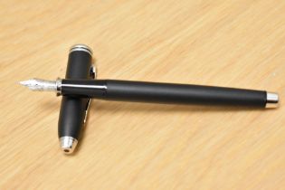 A Cross plunger fill fountain pen in matt black having Cross M nib