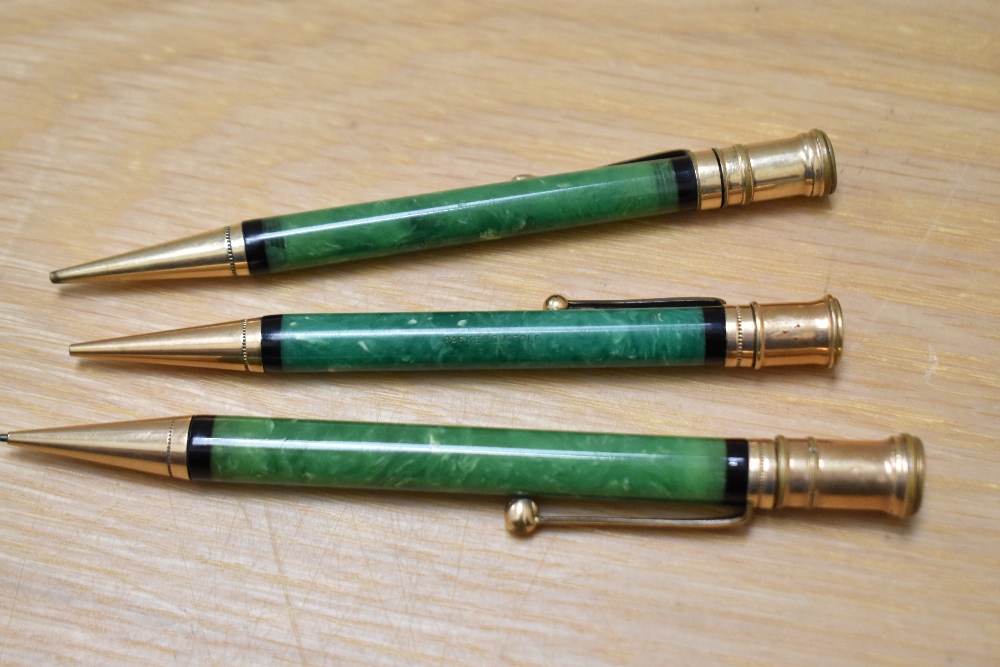 Three Parker Duofold propelling pencils in green all different sizes