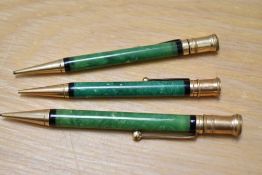 Three Parker Duofold propelling pencils in green all different sizes