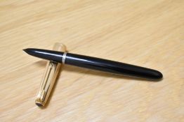 A Parker 51 MKI aerometric fill fountain pen in black with a rolled gold cap