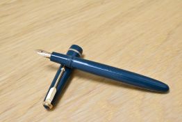 A Parker Duofold Junior aerometric fill fountain pen in green with narrow decorative band having