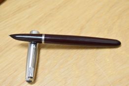 A Parker 51 aero fill fountain pen in burgundy with lustraloy cap. Boxed