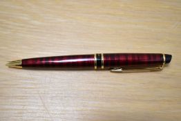 A boxed Waterman Expert II ballpoint pen in dune red laque