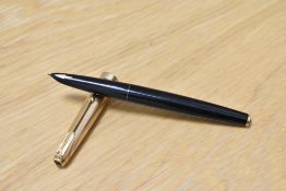 A Parker 61 First Edition capillary fill fountain pen in black with 14k gold fill cap bearing