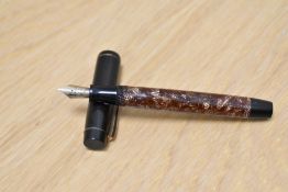 A Parker Victory MKI button fill fountain pen in lined rose/burgundy with single narrow band to