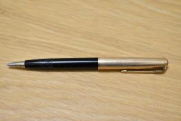 A Parker 51 propelling pencil in black with gold filled cap. Engraved