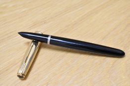 A Parker 51 MKI aerometric fill fountain pen in black with rolled gold cap. Small dints to the cap