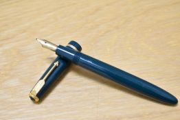 A Parker Duofold aero fill fountain pen in green with narrow decorative band to the cap having