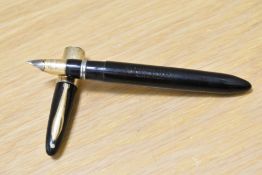 A Sheaffer Lifetime plunger fill fountain pen in black with very large band to cap having Sheaffer