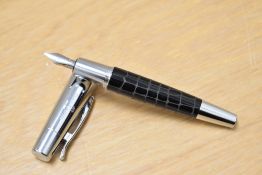 A Faber-Castell E-Motion converter fill fountain pen with spring clip to cap and crocodile skin