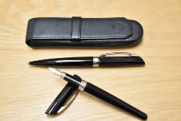 A rare boxed Caran d'Ache Dunas converter/ cartridge fountain pen and ballpoint pen set in black