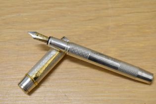 An Onoto University of Cambridge limited edition fountain pen 1/200 in solid sterling silver, with