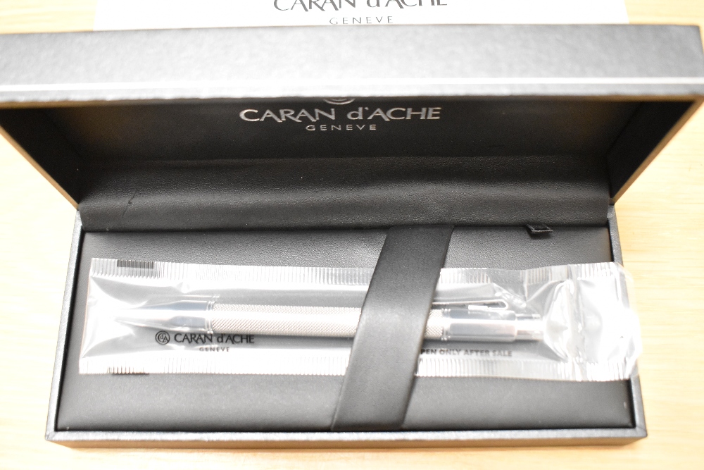 A boxed Caran d'Ache Varius Ivanhoe ballpoint pen in woven steel Ref:4480.014. As new still sealed - Image 2 of 2