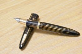 A Sheaffer Lady Sheaffer II Tuckaway 875 vacuum fill fountain pen in striated gold and brown