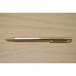 A Sheaffer gold plated ballpoint pen with reeded decal and white spot