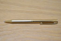 A Sheaffer gold plated ballpoint pen with reeded decal and white spot