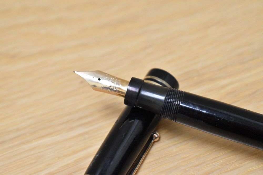 A Parker Duofold Lucky Curve Snr button fill fountain pen in black with two narrow bands to the - Image 3 of 4