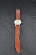 A gent's Omega De Ville wrist watch, case no: 136018, having a baton numeral dial with date aperture