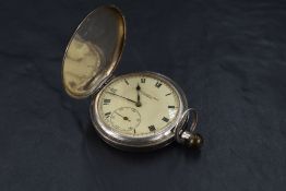 A silver hunter top wound pocket watch by Thomas Russell & Son, Liverpool having Roman numeral