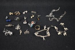 A small selection of white metal and silver jewellery including rings, earrings, Danecraft earrings,