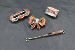 Four pieces of HM silver and white metal having mixed agate decoration, including a button hook,