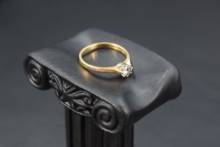 A diamond solitaire ring, having a brilliant cut diamond, approx 0.4ct in a raised claw set mount on