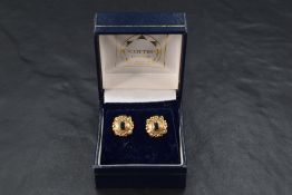 A pair of 9ct gold stud earrings with sapphire and seed pearl set moulded panels, approx 2.6g