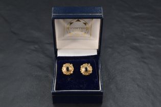 A pair of 9ct gold stud earrings with sapphire and seed pearl set moulded panels, approx 2.6g