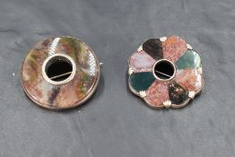 Two Scottish/Celtic white metal and agate target brooches of circular form, one being mixed pieces