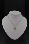 A 9ct gold cross and chain, approx 15' & 3.8g