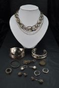 A small selection of white metal jewellery, most stamped 925, including bangles, chains, rings,