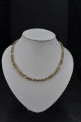 A 9ct gold figaro link chain, approx 18' & 44g