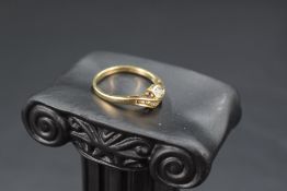 A 9ct gold serpent style ring having diamond chip decoration, size O & approx 2g