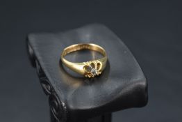 An 18ct gold diamond solitaire gypsy ring, approx 0.064ct, size Q & approx 3.6g