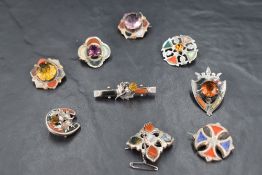 Eight Scottish/Celtic white metal & HM silver mixed agate brooches of various forms and a similar