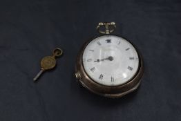 A Georgian silver pair cased key wound pocket watch having a fusee verge movement marked Leslie