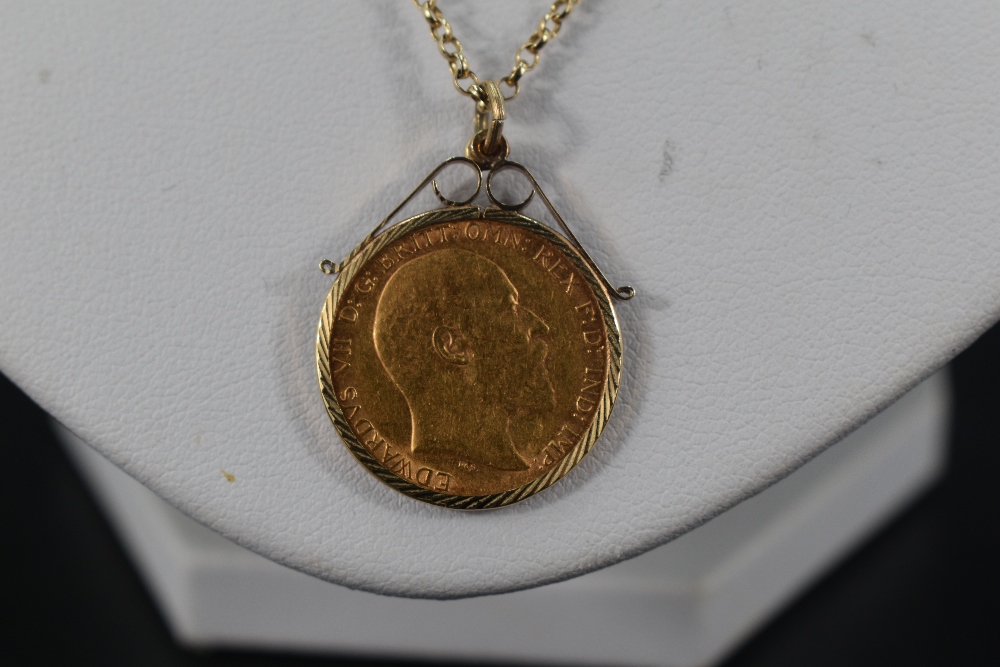 A gold half sovereign dated 1909 in a 9ct gold removable decorative pendant mount on a 9ct gold - Image 3 of 3